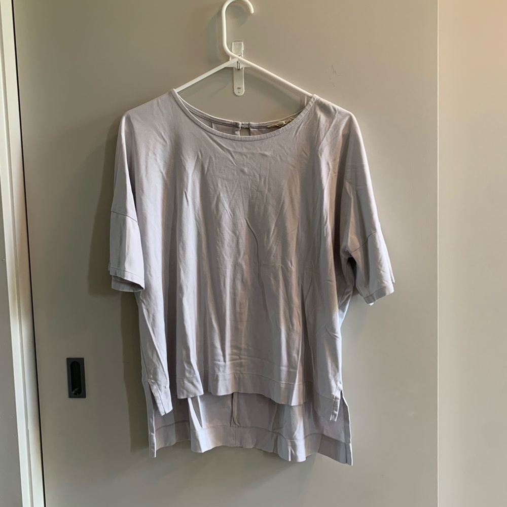 Oversized split hem top.